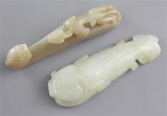 A Chinese jade belt hook and a Chinese jade figure of a cat fish, 19th and 20th century, 9.5cm